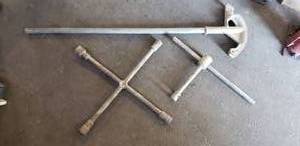 lot 201 image: Lot of 2 Tire Irons and Pipe Bender