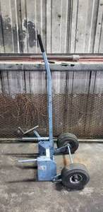 lot 430 image: OTC Brake Drum Dolly, Model 5017