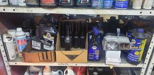lot 464 image: Shelf Contents - Brake Fluid, Power Steering Fluid, Fuel Cleaner & More  THIS ITEM MUST BE PICKED UP WEDNESDAY OR THURSDAY