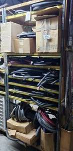 lot 534 image: Contents of Shelf.  Massive Quantity of Hoses.  SHELF NOT INCLUDED  THIS ITEM MUST BE PICKED UP WEDNESDAY OR THURSDAY