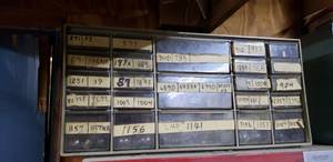lot 545 image: Plastic 23-Drawer Parts Bin.  Contents Included.  Trailer Light Bulbs.
