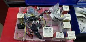 lot 573 image: Bin of Misc Switches, Sensors & Indicator Lights.  See Part #s for Specifics  THIS ITEM MUST BE PICKED UP WEDNESDAY OR THURSDAY