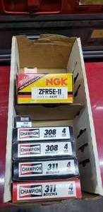 lot 596 image: Lot of Champion and NGK.  See Part #s for Specifics  THIS ITEM MUST BE PICKED UP WEDNESDAY OR THURSDAY
