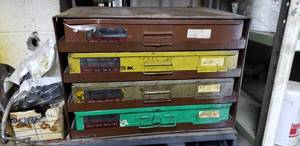 lot 664 image: Sliding 4 Drawer Cabinet WITH Contents - Contents Include Oil Drain Plugs, Woodruff Keys, and Carburetor Rod Clips