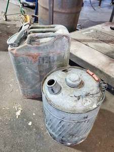 lot 179 image: Lot of 2 Vintage Gas Cans, 1 Galvanized and 1 Military Issue