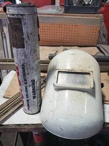 lot 317 image: Welding Helmet and Container of Premium Welding Electrodes