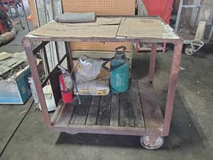 lot 322 image: Rolling Cart w Contents. Including Fire Extinguisher, 2 Bags of Sand and Sprayer