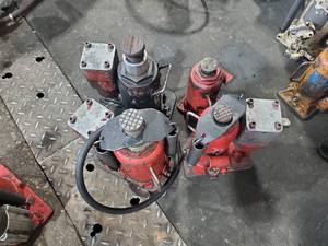 lot 348 image: Lot of 3 Air Over Hydraulic Bottle Jacks & 1 Hydraulic Bottle Jack.  1 20-Ton and 3 10-Ton