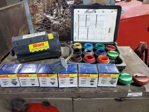 lot 380 image: Stant Model 12440 Fuel Cap Tester w Case of Caps & Extra Caps