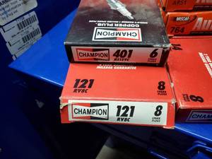 lot 599 image: Large Lot of Spark Plug and Valve Stem Covers.  See Part #s for Specifics  THIS ITEM MUST BE PICKED UP WEDNESDAY OR THURSDAY