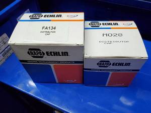 lot 603 image: Lot of 2 Napa Echlin Distributer Caps  THIS ITEM MUST BE PICKED UP WEDNESDAY OR THURSDAY