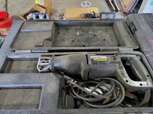 lot 686 image: Black & Decker Professional Variable Speed Cutsaw Reciprocating, Model 3104 Saw w Case & Extra Case Full of Blades