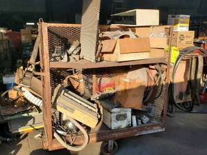 lot 790 image: Contents of Cart - Filters, Hose Reel, Radiator, and More - Cart NOT Included  THIS ITEM MUST BE PICKED UP WEDNESDAY OR THURSDAY