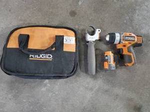 lot 802 image: Ridgid 12v Cordless Drill w Battery, Bag & Attachment
