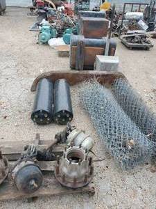 lot 987 image: Entire Contents of Row - Contents Include Engines, Transmission, Lawn Equipment, and More - SEE PHOTOS