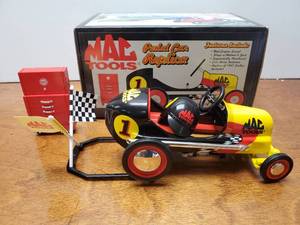 lot 918 image: Mac Tools Pedal Car Replica w Helmet, Stand, Flags, Tool Chest, Original Box, Packaging & COA