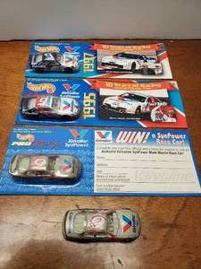 lot 930 image: Lot of 4 Hotwheels  Racing NASCAR Diecast Cars