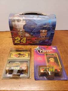 lot 931 image: Lot of Jeff Gordon Collectibles.  2 Diecast Cars & 1 Lunchbox