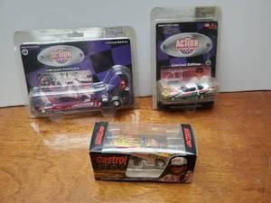 lot 939 image: Lot of 3 Action Diecast Collectible Cars.  Blaine Johnson & John Force (x2)