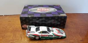 lot 869 image: AUTOGRAPHED Action Diecast 124 1997 John Force Castrol Mustang Funny Car, Limited Edition