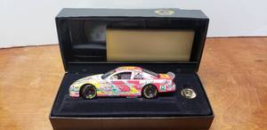 lot 879 image: Action Elite Diecast 124 1998 Terry Labonte #5 Kelloggs Iron Man 500 Straight Starts Monte Carlo, Limited Edition w Collectors Coin