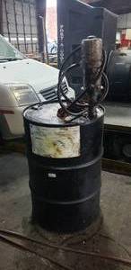 lot 1036 image: 55 Gallon Drum of Valvoline 50W Synthetic Oil with Pump - Approximately 50% Full