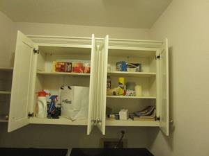 lot 30 image: CABINET CONTENTS IN LAUNDRY ROOM, CLEANING SUPPLIES, DETERGENTS, LIGHT BULBS AND MORE