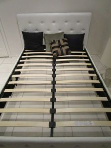 lot 19 image: WHITE, TUFTED PLATFORM BED FRAME, GREAT CONDITION