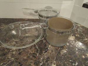 lot 55 image: NEAR PERFECT CONDITION 2 PYREX POTS WITH HANDLES AND LIDS