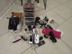 lot 39 image: PHONES, CDS, HEADPHONES, SUNGLASSES, ALARM CLOCK