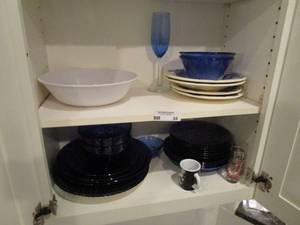 lot 54 image: CONTENTS OF 2 SHELVES, COBALT BLUE DISHES, PIER 1 DISH SET, COFFEE MUGS