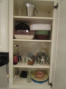 lot 65 image: CONTENTS OF CABINET- ORANGE &amp WHITE PATINA VIE BOWL, CRYSTAL OIL VINEGAR CRUET, CRYSTAL WINE GLASSES &amp MUCH MORE