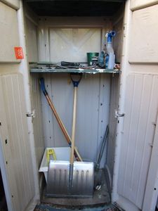 lot 100 image: CONTENTS IN SHED, SPRINKLERS, KNOPPERS, LARGE WHITE SQUARE PLANT HOLDER, 2 RAKES, 2 SHOVELS