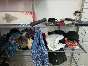 lot 148 image: LARGE LOT OF WALLETS, HATS, SCARVES, BOAS, GLOVES, &amp BAGS