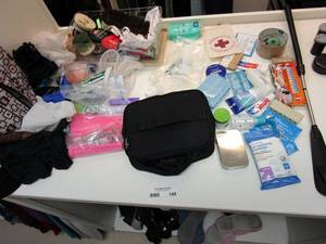 lot 149 image: MANY TRAVEL TOILETRIES AND TOILETRY BAG, SHOE CLEAN &amp SHINE KIT, SHOE HORN WITH LONG HANDLE &amp MORE