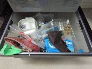 lot 165 image: VERTICLE SECTION OF 3 DRAWERS, MAKE UP BAGS, MARY KAY NAIL POLISH, A WATCH, &amp MORE, CLOSET FIXTURES NOT INCLUDED