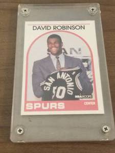 lot 170 image: 1989 NBA Hoops David Robinson Rookie Card #138 autographed on back of card (Authenticity Unknown)