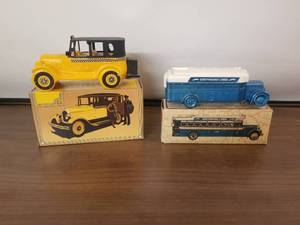 lot 55 image: Avon After Shave bottles - 1931 Greyhound Bus and 1926 Checker Cab