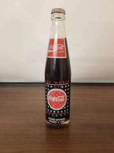 lot 7 image: 1990 The world of Coca Cola in Atlanta Grand Opening bottle