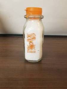 lot 8 image: Laesch Dairy- Bloomington, Illinois -  Half Pint glass milk bottle with top