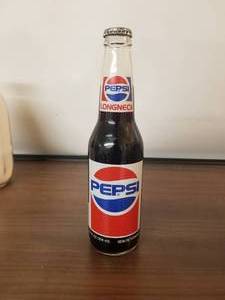 lot 9 image: Richard Petty Pepsi 7 time champion bottle