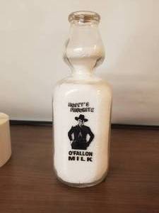 lot 11 image: Hoppys Favorite OFallon Milk - Quart glass creamer-milk bottle with lid