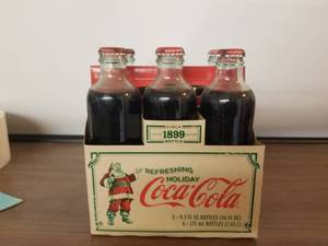 lot 19 image: Limited edition Refreshing Holiday Coca Cola 6 pack circa 1899 -
