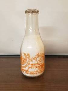 lot 30 image: Markwell - Sulphur, Oklahoma -  glass quart milk bottle-Everything is better with butter with lid