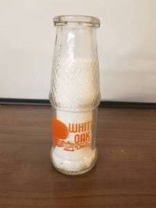lot 42 image: White Oak Dairy pint glass milk bottle