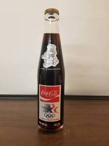lot 53 image: 1980 LA Olympic Commemorative Coke Bottle