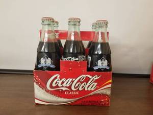lot 69 image: The Ballpark in Arlington Coke 6 pack bottles