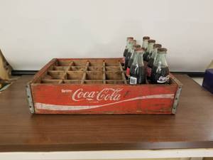lot 165 image: Vintage Red wooden 24 bottle Coca Cola crate with 8 bottles