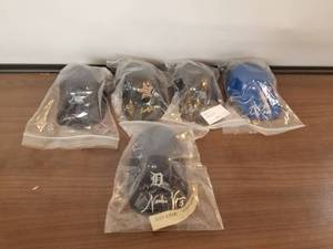 lot 242 image: Autographed mini batting helmets - Authenticity unknown