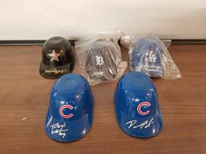 lot 243 image: Autographed mini batting helmets - Authenticity unknown